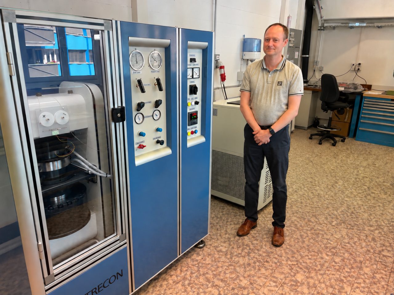 Mads Kylling with industrial mechanical engineering equipment